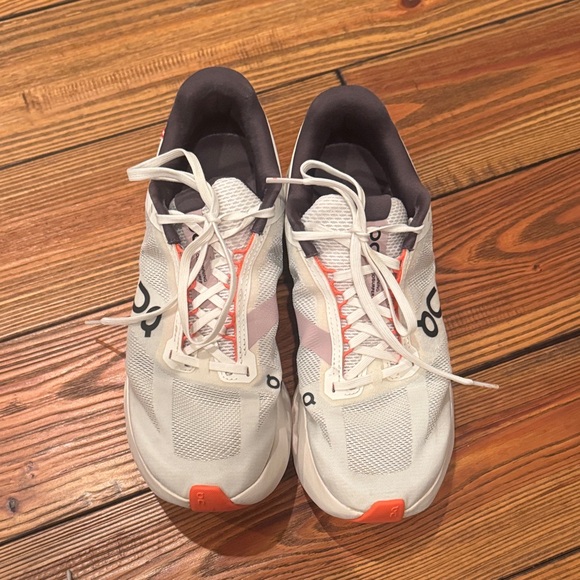 On Running White and Black Sneakers with Orange Detail - Picture 4 of 6